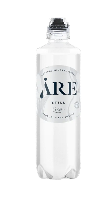 PET bottle container with sports cap, filled with natural mineral water.