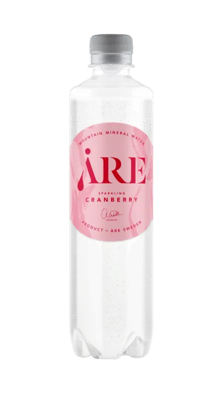 PET bottle container filled with carbonated mineral water with cranberry flavour.